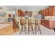 Bright kitchen featuring granite countertops, tile floors, stainless steel appliances, and a breakfast bar with seating at 2369 Clandon Dr., Myrtle Beach, SC 29579