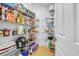 Pantry with metal shelving stocked with groceries and household items, and a light wood floor at 2369 Clandon Dr., Myrtle Beach, SC 29579