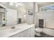 Bright bathroom with white vanity, shower-tub combo, and neutral decor at 2510 Oriole Dr., Murrells Inlet, SC 29576