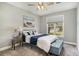Cozy bedroom with a plush bed, carpet flooring, and natural light from a window at 2510 Oriole Dr., Murrells Inlet, SC 29576