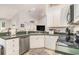 Functional kitchen layout with stainless steel appliances, ample counter space, and open to the living area at 2510 Oriole Dr., Murrells Inlet, SC 29576