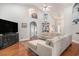 Bright and airy living room featuring high ceilings, arched details, and comfortable seating area at 2510 Oriole Dr., Murrells Inlet, SC 29576