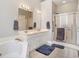 Bright bathroom with double vanity, separate shower, soaking tub, and modern fixtures at 2510 Oriole Dr., Murrells Inlet, SC 29576