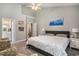 Spacious bedroom with neutral walls, carpet flooring, ceiling fan, and natural light from a window at 2510 Oriole Dr., Murrells Inlet, SC 29576