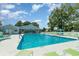 Community pool with crystal clear water, ample seating, and a sunny sky at 2510 Oriole Dr., Murrells Inlet, SC 29576