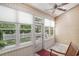 Inviting sunroom with large windows, natural light, and a view of the well-maintained backyard at 2510 Oriole Dr., Murrells Inlet, SC 29576