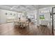 Elegant dining room with coffered ceilings, pendant lighting, and open access to the kitchen and living areas at 264 Switchgrass Loop, Little River, SC 29566
