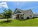 Charming home with a well-manicured lawn, a two-car garage, and attractive landscaping at 264 Switchgrass Loop, Little River, SC 29566