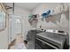 Functional laundry room with modern appliances and storage, making laundry chores efficient and easy at 264 Switchgrass Loop, Little River, SC 29566