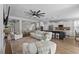 Open-concept living area seamlessly connects the kitchen and dining spaces, perfect for modern living and entertaining guests at 264 Switchgrass Loop, Little River, SC 29566