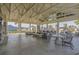 Large recreation area with ample seating, tables, and palm trees, perfect for gatherings at 264 Switchgrass Loop, Little River, SC 29566