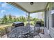 Screened patio with grill and seating area, perfect for outdoor cooking and entertaining at 2685 Scarecrow Way, Myrtle Beach, SC 29579