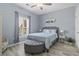 Cozy bedroom featuring a comfortable bed, soothing decor, ceiling fan, and a window with natural light at 314 Black Oak Ln. # 102, Murrells Inlet, SC 29576