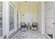 Comfortable front porch with seating, offering a relaxing outdoor space at 314 Black Oak Ln. # 102, Murrells Inlet, SC 29576