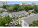 Aerial view showcasing well-maintained townhomes with lush landscaping and convenient parking at 315 72Nd Ave. N # A, Myrtle Beach, SC 29572