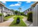 Beautifully landscaped community with lush greenery and inviting walkways at 315 72Nd Ave. N # A, Myrtle Beach, SC 29572