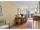 Traditional dining room with hardwood floors, wooden table and chairs, and lots of lighting at 315 72Nd Ave. N # A, Myrtle Beach, SC 29572