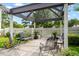 Charming gazebo surrounded by lush greenery and cozy seating at 315 72Nd Ave. N # A, Myrtle Beach, SC 29572