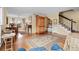 Inviting living room with hardwood floors, staircase and natural light at 315 72Nd Ave. N # A, Myrtle Beach, SC 29572