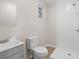 This bathroom offers a new shower, toilet, and vanity with luxury vinyl flooring at 3269 Sims Rd., Marion, SC 29571