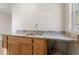 Bathroom vanity offers granite countertops with wood cabinets and luxury vinyl flooring at 3269 Sims Rd., Marion, SC 29571
