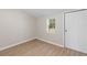 The bedroom features a new window, paint, and luxury vinyl flooring at 3269 Sims Rd., Marion, SC 29571