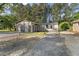 View of garage featuring multiple bays and gravel surround at 3269 Sims Rd., Marion, SC 29571