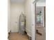 Utility room area with water heater and durable wood-look flooring at 3269 Sims Rd., Marion, SC 29571