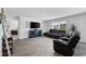 Comfortable living room with modern furniture, large windows, and recessed lighting at 417 Spruce Pine Way, Conway, SC 29526