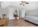 Neutral bedroom offers wood floors, ceiling fan, and ample natural light at 4536 Fringetree Dr., Murrells Inlet, SC 29576
