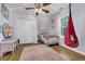 Bedroom with statement light fixture, and adjacent closet at 4536 Fringetree Dr., Murrells Inlet, SC 29576