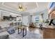 Cozy living room showcasing hardwood floors, natural light, and stylish furnishings at 4536 Fringetree Dr., Murrells Inlet, SC 29576