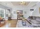 Relaxing living area featuring hardwood floors, soft lighting, and comfortable seating at 4536 Fringetree Dr., Murrells Inlet, SC 29576