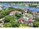 Expansive aerial view of the real estate and community with waterway access and lush landscaping at 4650 Greenbriar Dr. # A5, Little River, SC 29566