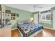 Cozy bedroom with a comfortable bed, natural light from the window, and ample closet space at 4650 Greenbriar Dr. # A5, Little River, SC 29566