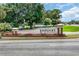 Eastport Golf Community entrance sign, framed by lush landscaping and brick columns at 4650 Greenbriar Dr. # A5, Little River, SC 29566