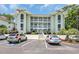 Well-maintained condo building with designated parking and lush landscaping, providing convenient and attractive living at 4650 Greenbriar Dr. # A5, Little River, SC 29566