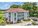 Scenic view of condo building overlooking a golf course, featuring private balconies and parking at 4650 Greenbriar Dr. # A5, Little River, SC 29566