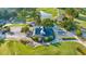 Aerial view of the golf clubhouse, parking, with landscaped green spaces at 4650 Greenbriar Dr. # A5, Little River, SC 29566