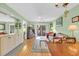 Bright living room features a ceiling fan and sliding glass doors to the patio at 4650 Greenbriar Dr. # A5, Little River, SC 29566