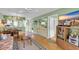 Bright living room with hardwood floors and an open layout, featuring seamless transition to other living areas at 4650 Greenbriar Dr. # A5, Little River, SC 29566