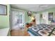 Main bedroom features a sliding door to a patio and a ceiling fan at 4650 Greenbriar Dr. # A5, Little River, SC 29566