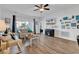 Comfortable living room with wood floors, neutral furniture, and decorative wall art at 4821 Luster Leaf Circle # 202, Myrtle Beach, SC 29577