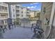 Patio with seating overlooking the landscaped community featuring a view of nearby buildings at 4821 Luster Leaf Circle # 202, Myrtle Beach, SC 29577