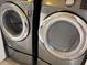 Newer stainless steel washer and dryer appliances, providing convenience and efficiency for laundry needs at 4840 Moss Creek Loop # 31, Murrells Inlet, SC 29576