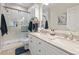 Clean and well-maintained bathroom with a double sink vanity and glass-enclosed shower at 4887 Luster Leaf Circle # 104, Myrtle Beach, SC 29572