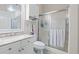 Bright bathroom with a single sink vanity, mirrored cabinet, and shower-tub combination at 4887 Luster Leaf Circle # 104, Myrtle Beach, SC 29572