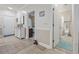 Inviting home foyer with tile flooring and entry to bathroom and living area at 4887 Luster Leaf Circle # 104, Myrtle Beach, SC 29572