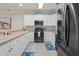 Modern kitchen with stainless steel appliances, white cabinets and ample counter space at 4887 Luster Leaf Circle # 104, Myrtle Beach, SC 29572