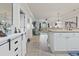 Open-concept living area visible from the kitchen, with a spacious layout and natural light at 4887 Luster Leaf Circle # 104, Myrtle Beach, SC 29572